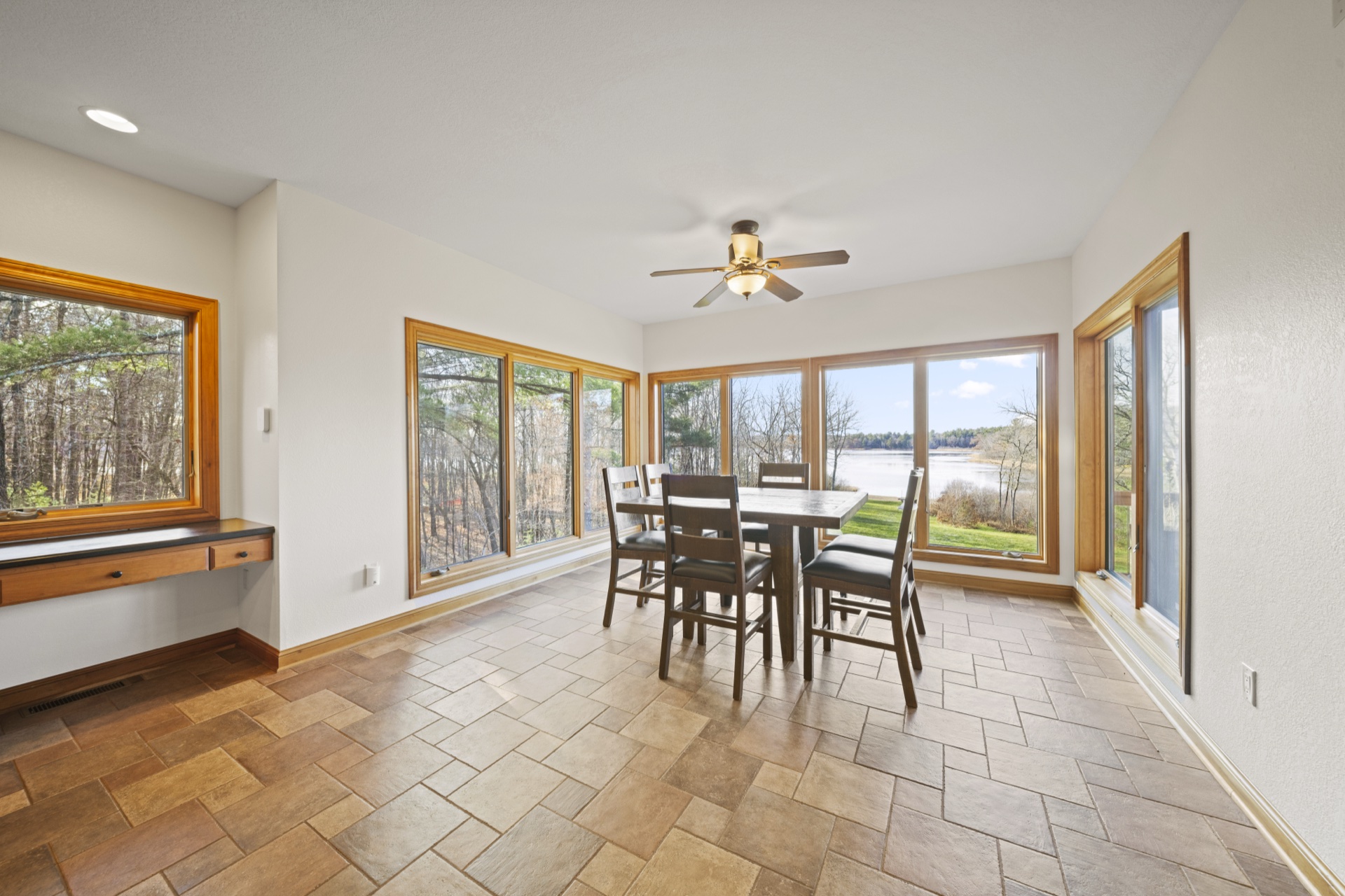 Breakfast nook with panoramic lake views and casual seating