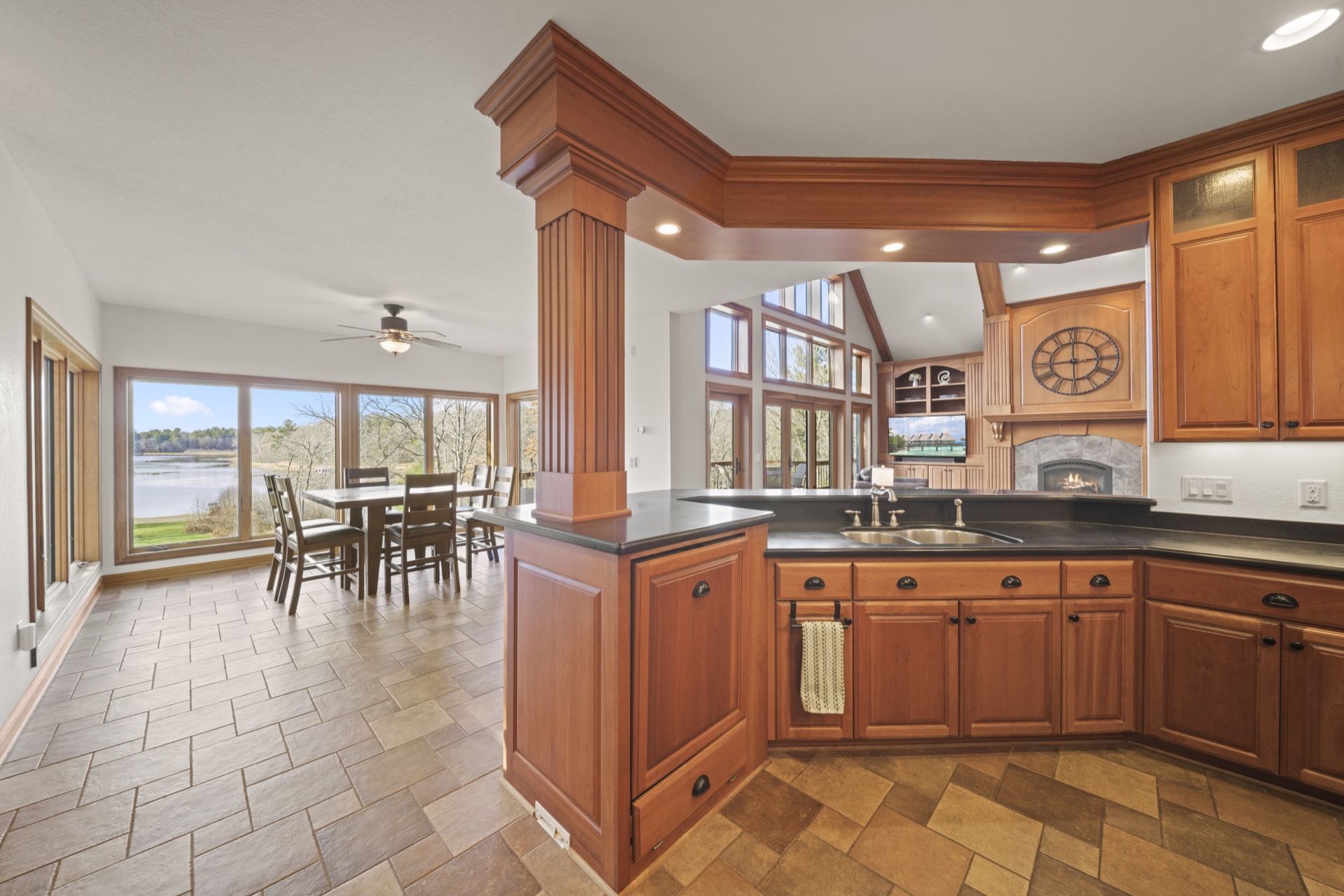 Kitchen with floor-to-ceiling windows overlooking Long Lake