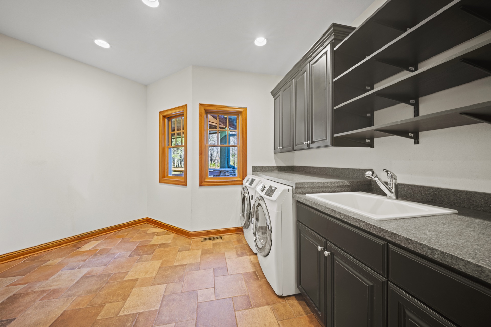 Full-size washer and dryer in dedicated laundry room