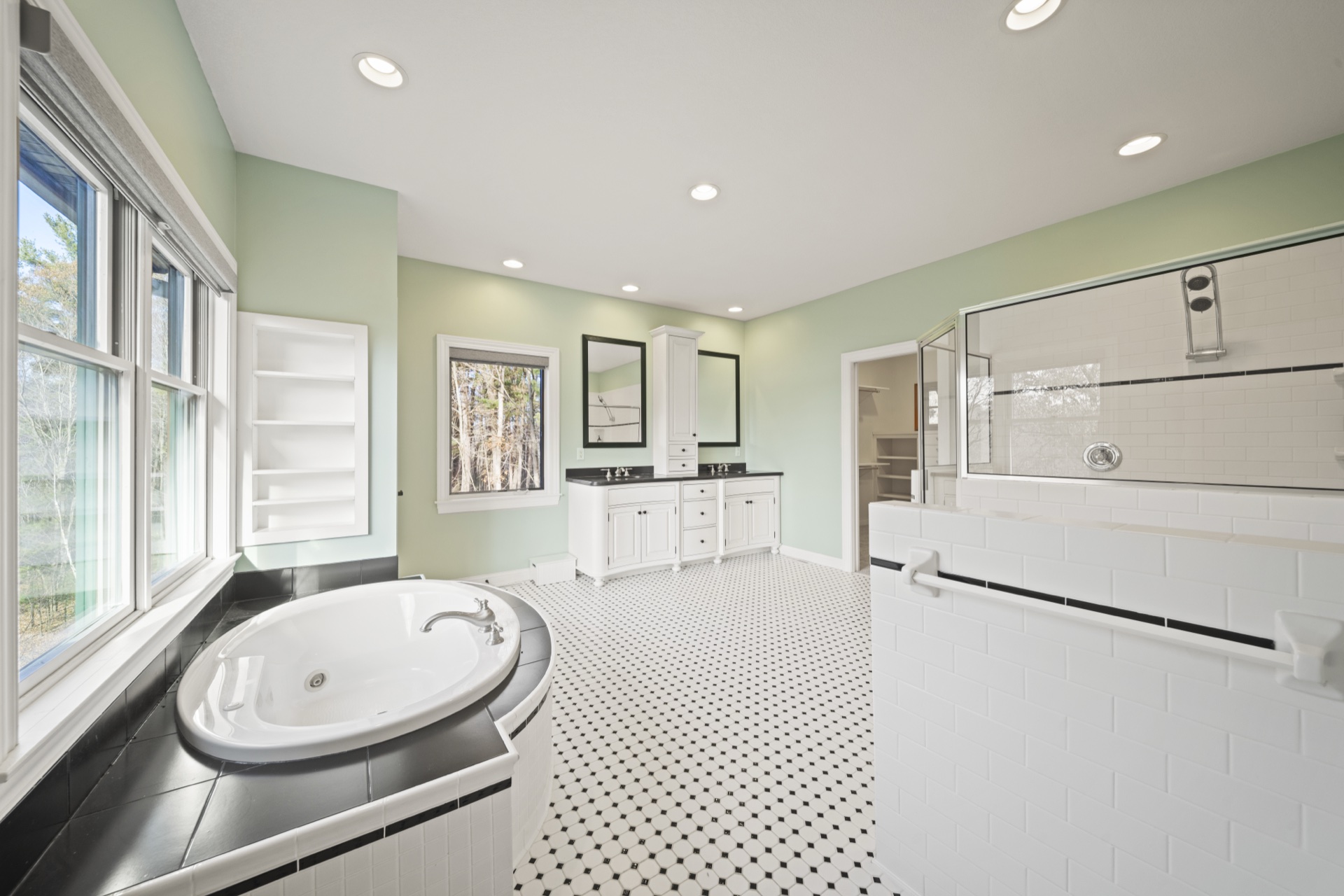 Primary bathroom soaking tub with separate shower