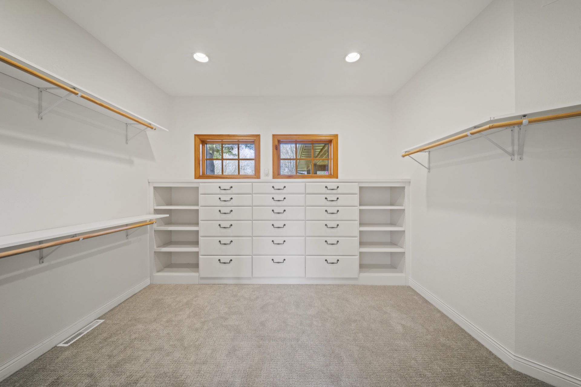 Spacious walk-in closet in primary bedroom suite